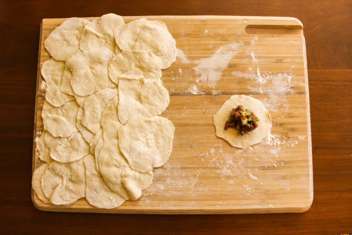 Adding the dumpling filling
