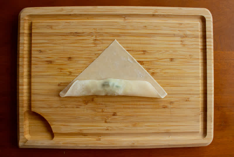 Wrapping spring rolls step 3