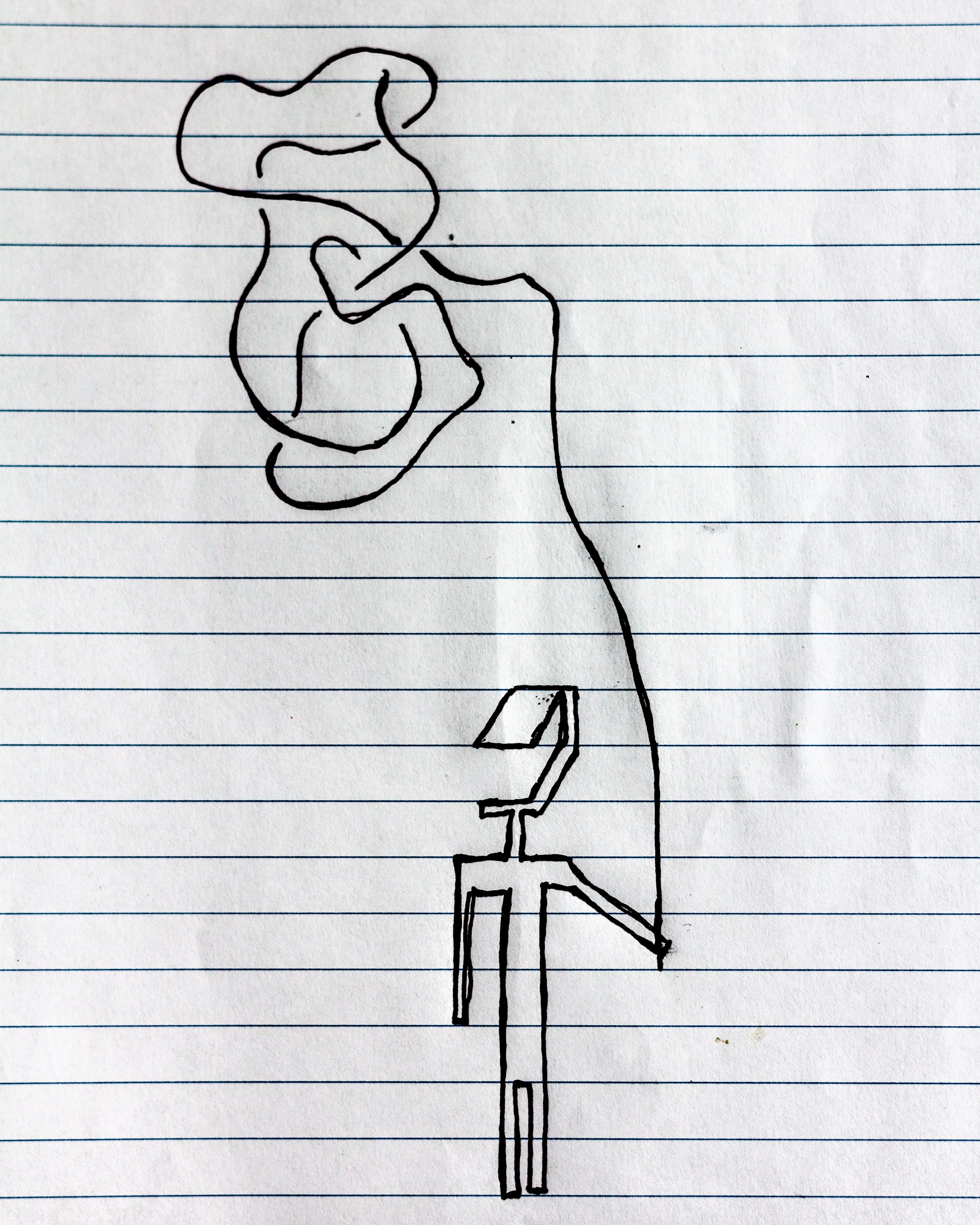 A drawing of a little boy holding a balloon.