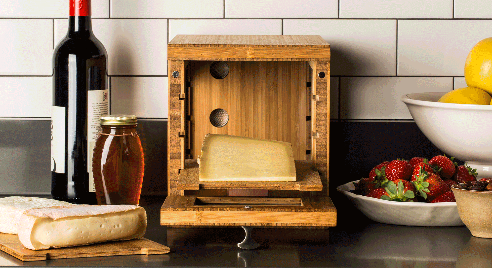 Gif of different wine gadgets in a home setting.
