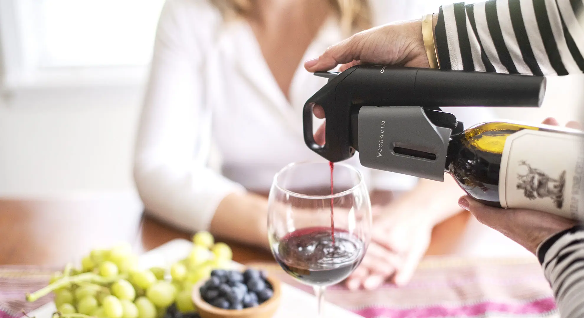 Model Three Wine Preservation System pouring red wine
