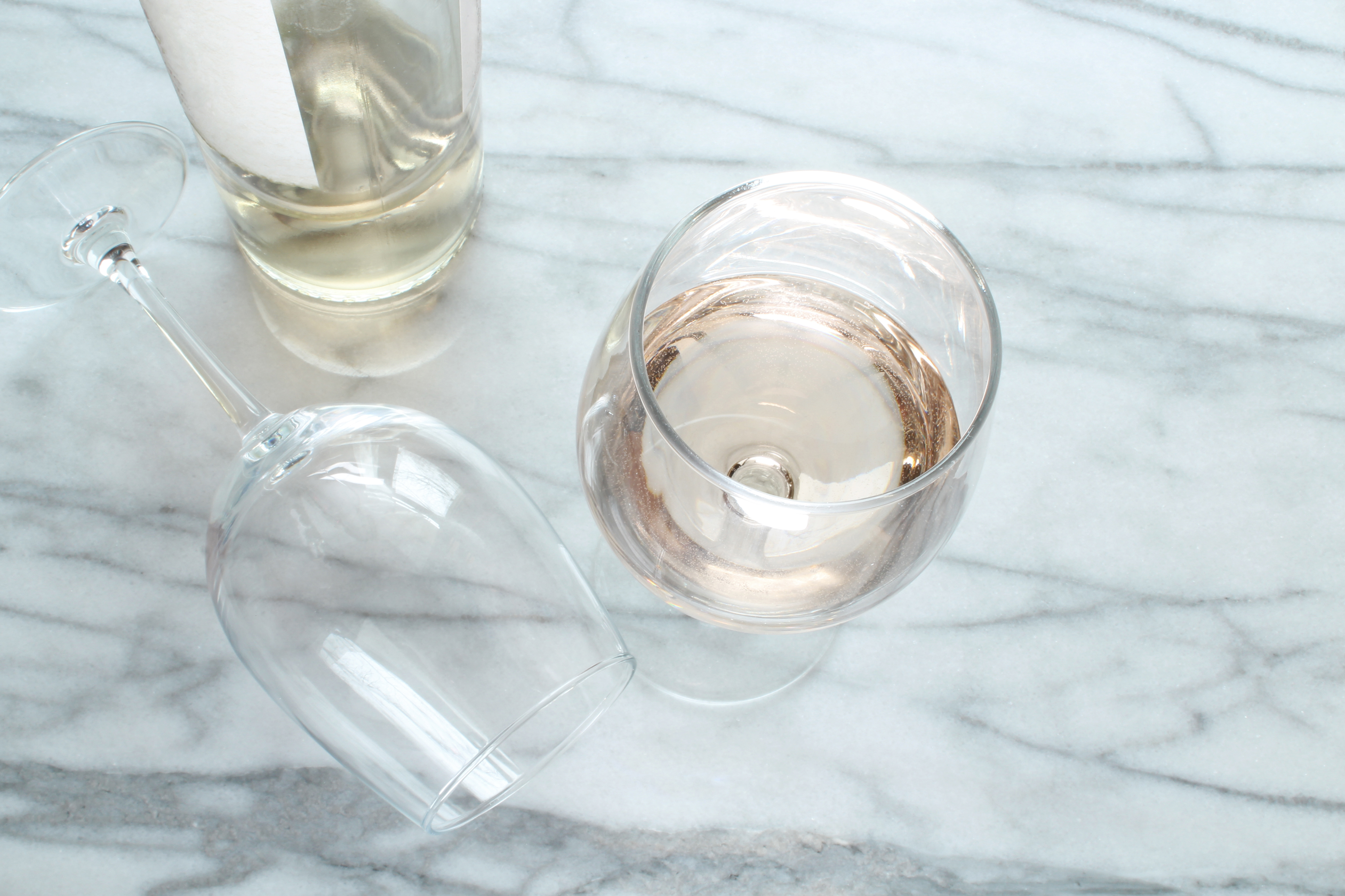 wine cheers Moscato on marble 