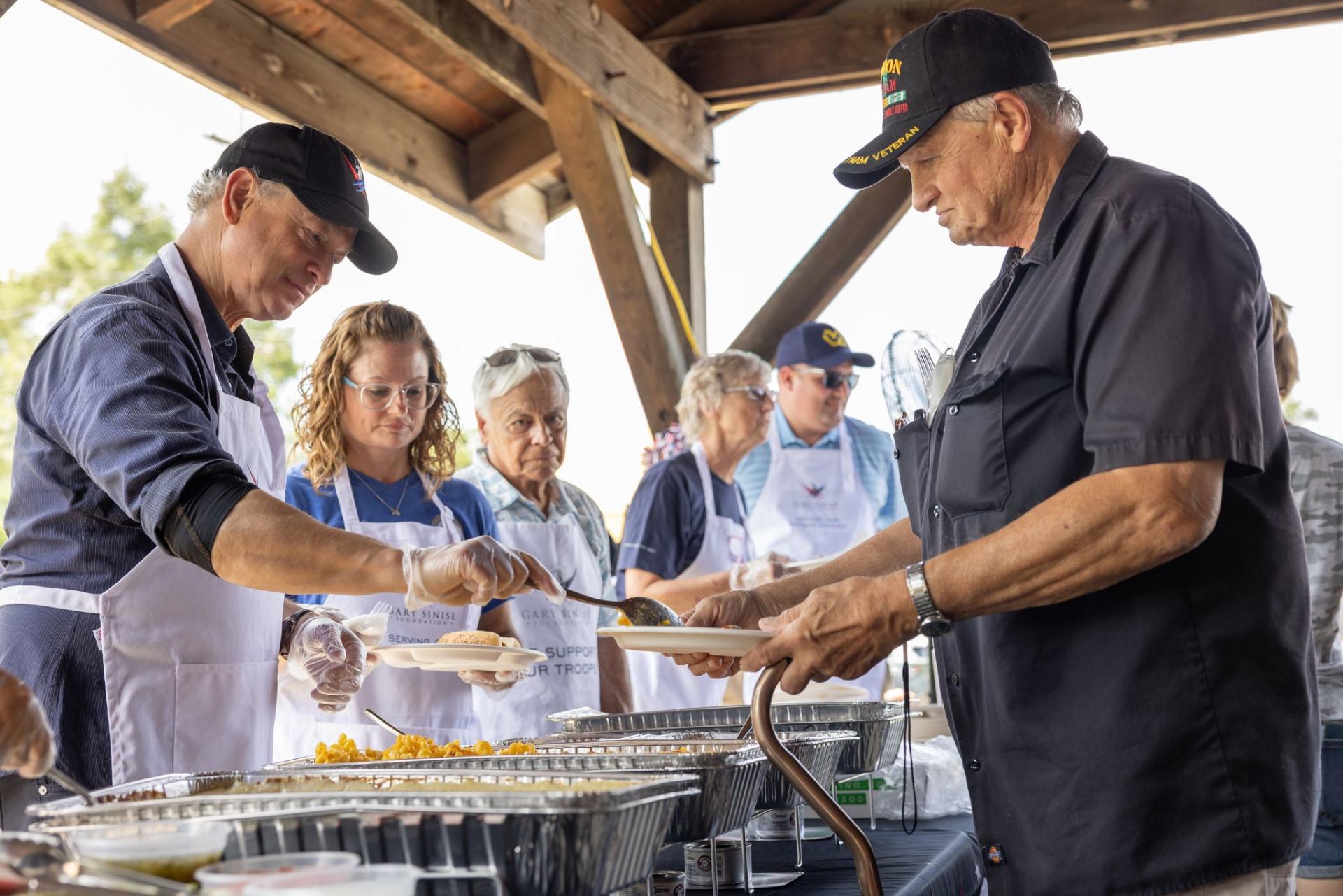 Gary Sinise Serves 1 Millionth Serving Heroes Meal on 4th of July