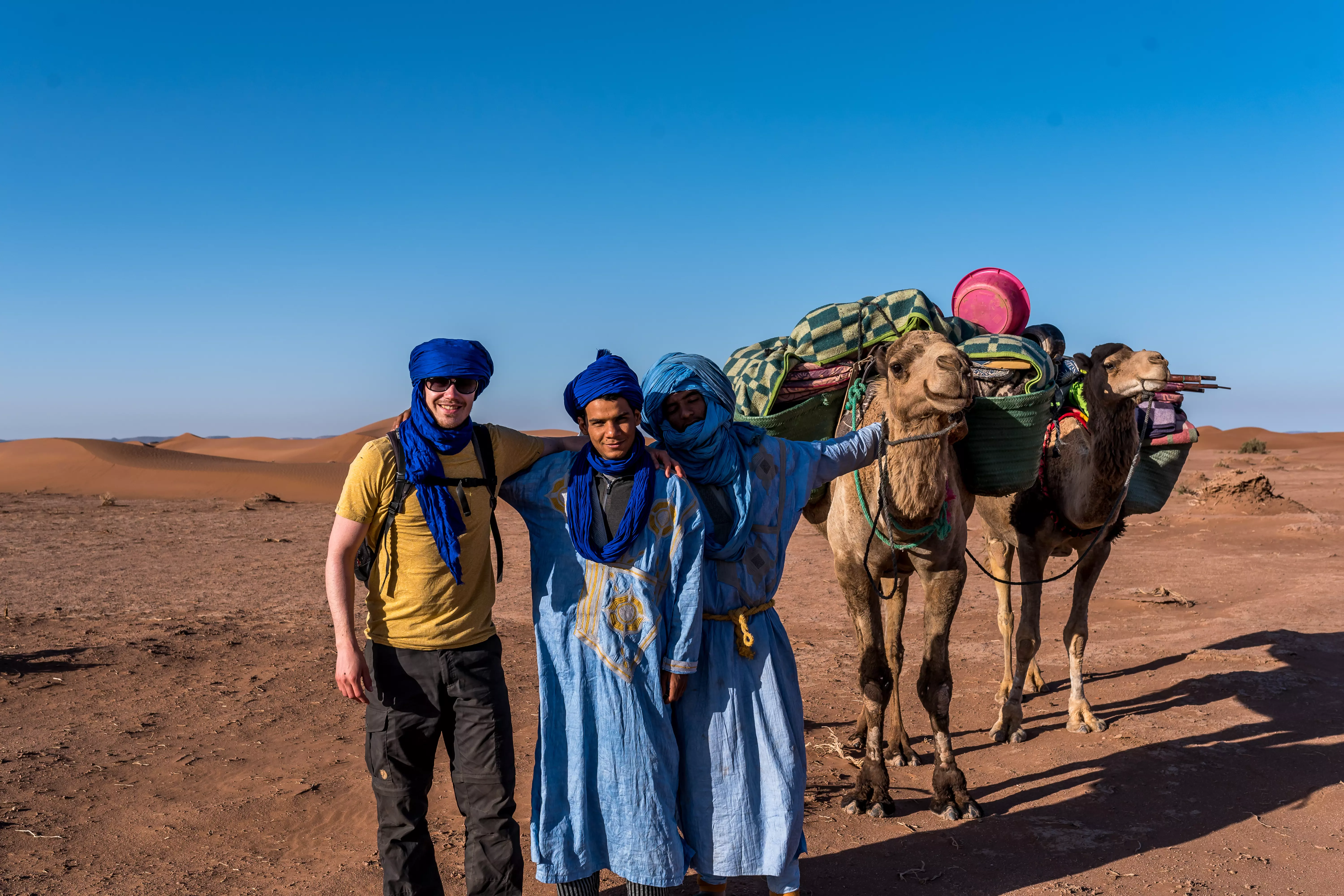 Aziz with friends and camels