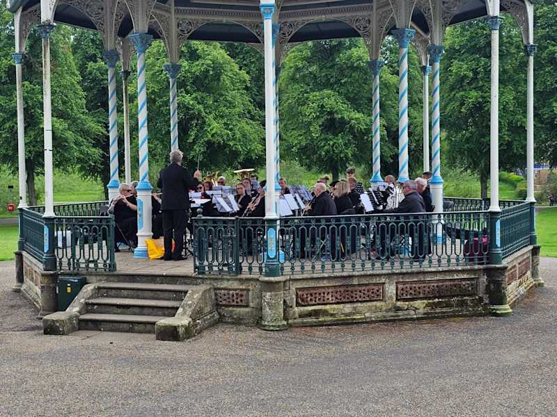 Telford Concert Band playing in a band stand