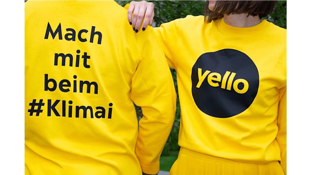 Gelbes Yello Shirt mit der Aufschrift "Mach mit beim #Klimai"