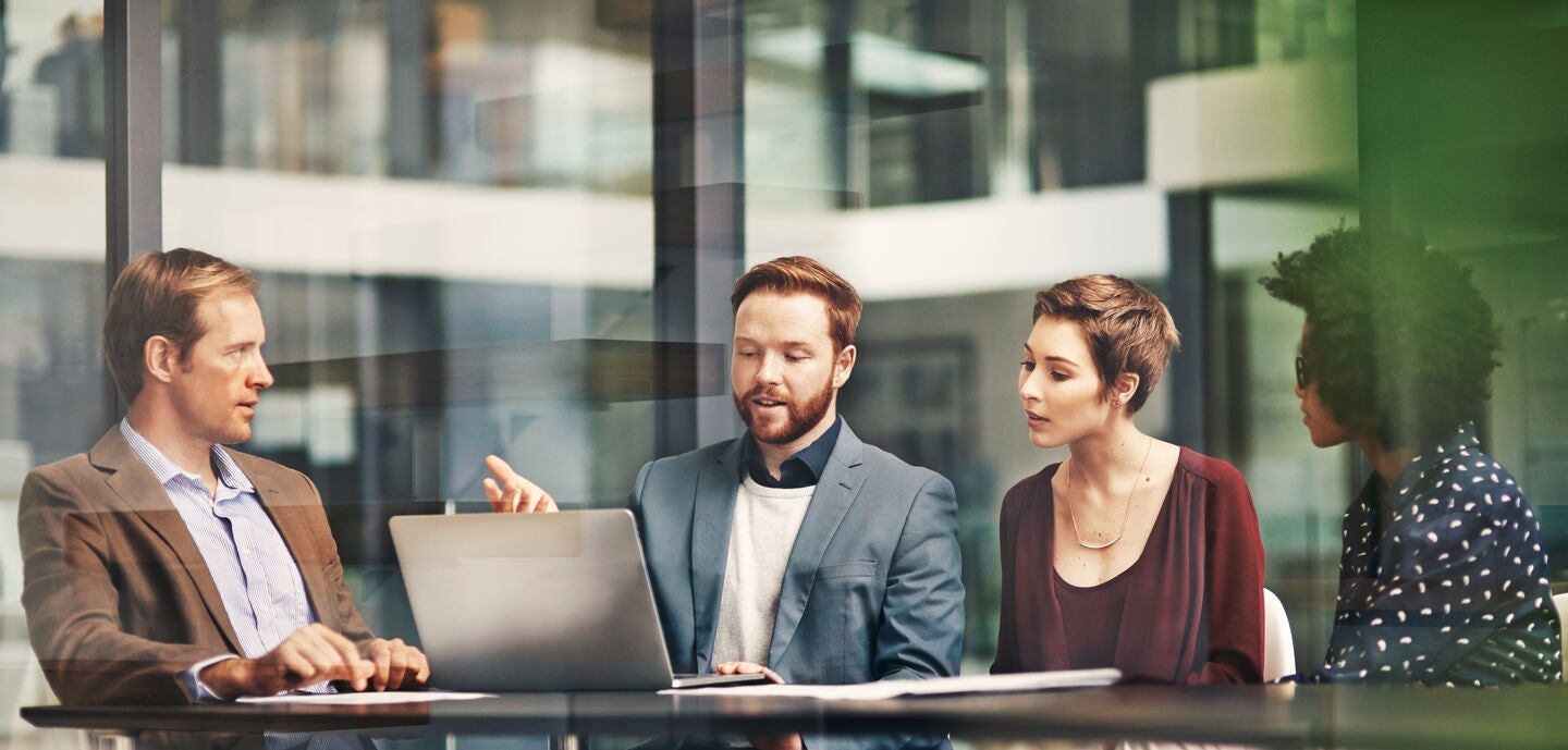 Two men and a woman having a conversation