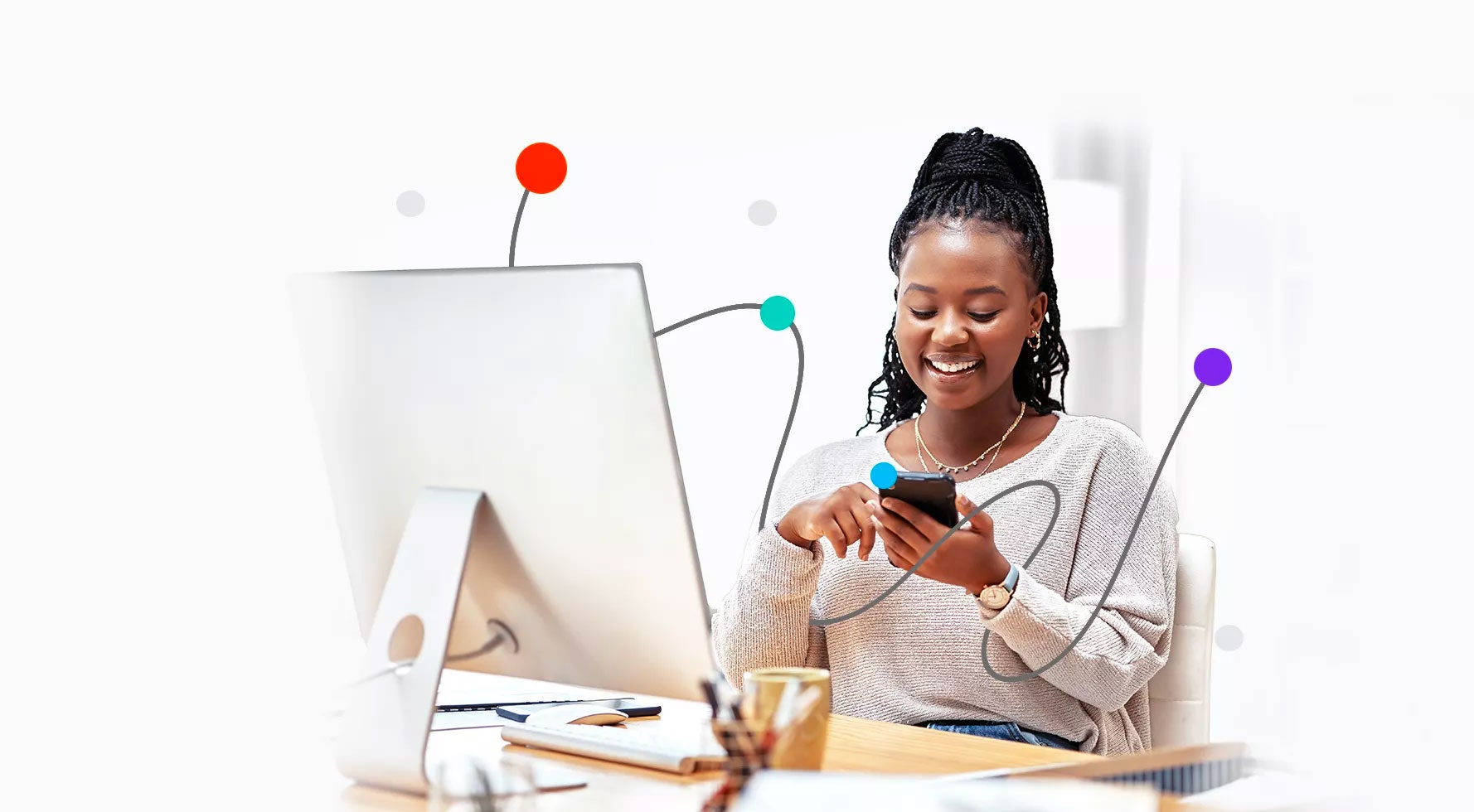 image showing person on mobile phone at a desk