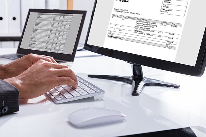 invoice computer at workplace