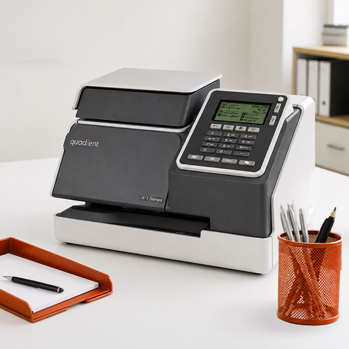 iX-1 Postage Meter sitting on desk