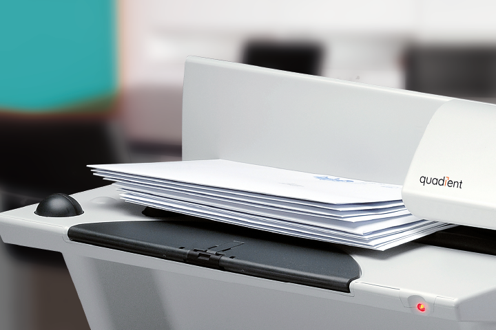 Image of envelopes on stting on opening machine