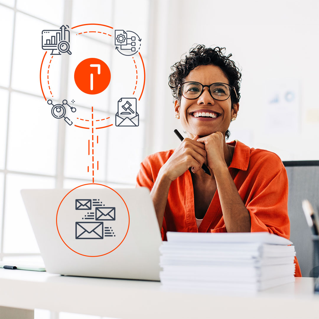 Smiling woman in orange blazer at desk with laptop, surrounded by orange and gray business mail addressing automation workflow icons.