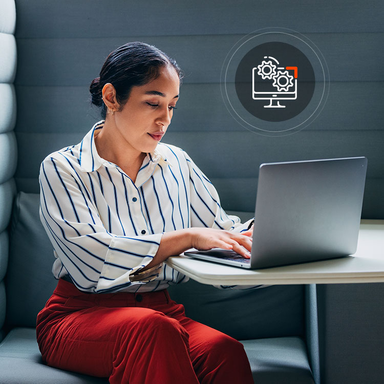 woman at computer with automation icon