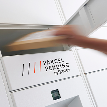 Person collecting package from parcel locker