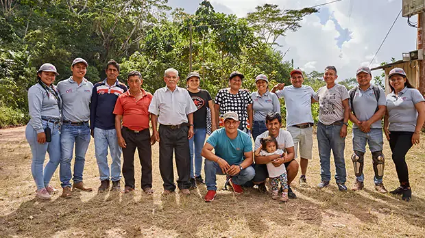 A group picture of ofi workers in Peru