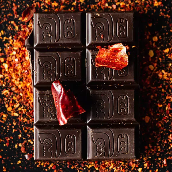 Chocolate bar topped with red powder