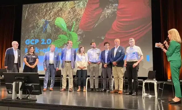 A group of people standing on stage