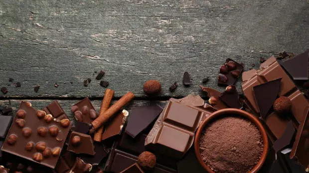 Different types of chocolate from dark to milk, with added nuts or without