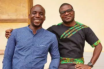 Two men posing for the camera