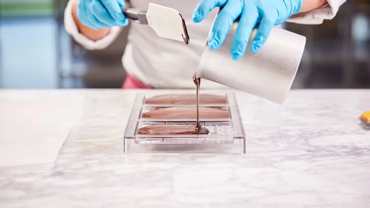 Large-Pouring chocolate into molds 8