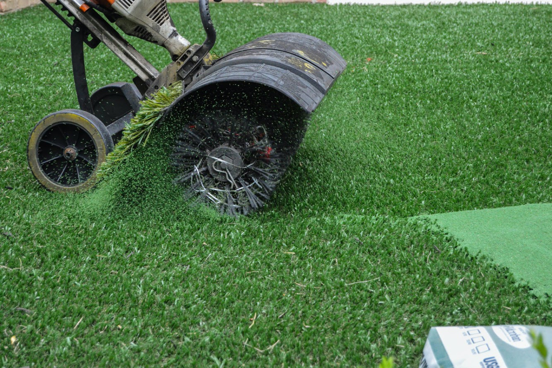 Artificial grass on sale installation cost