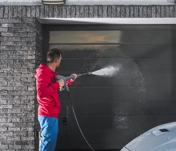 garage door maintenance image; orange checklist icon