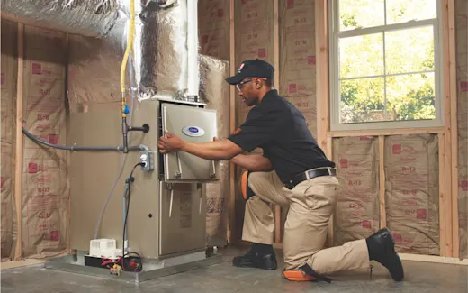 HDHS Service Provider doing a tune-up on a furnace