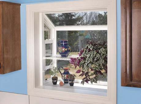 a garden window holding vases and plants