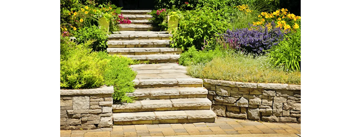 A charming stone backyard staircase