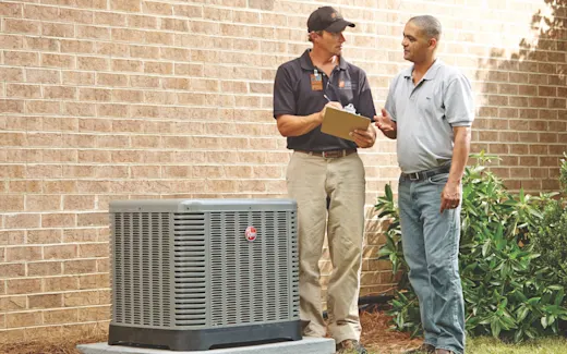 HVAC Installer giving a customer an AC consultation