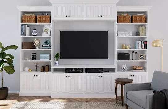 Image of a casual style custom entertainment center with white beadboard cabinets and display shelves
