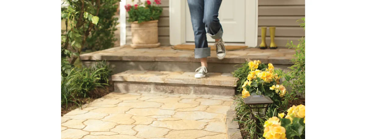 A stone residential front entry stairway