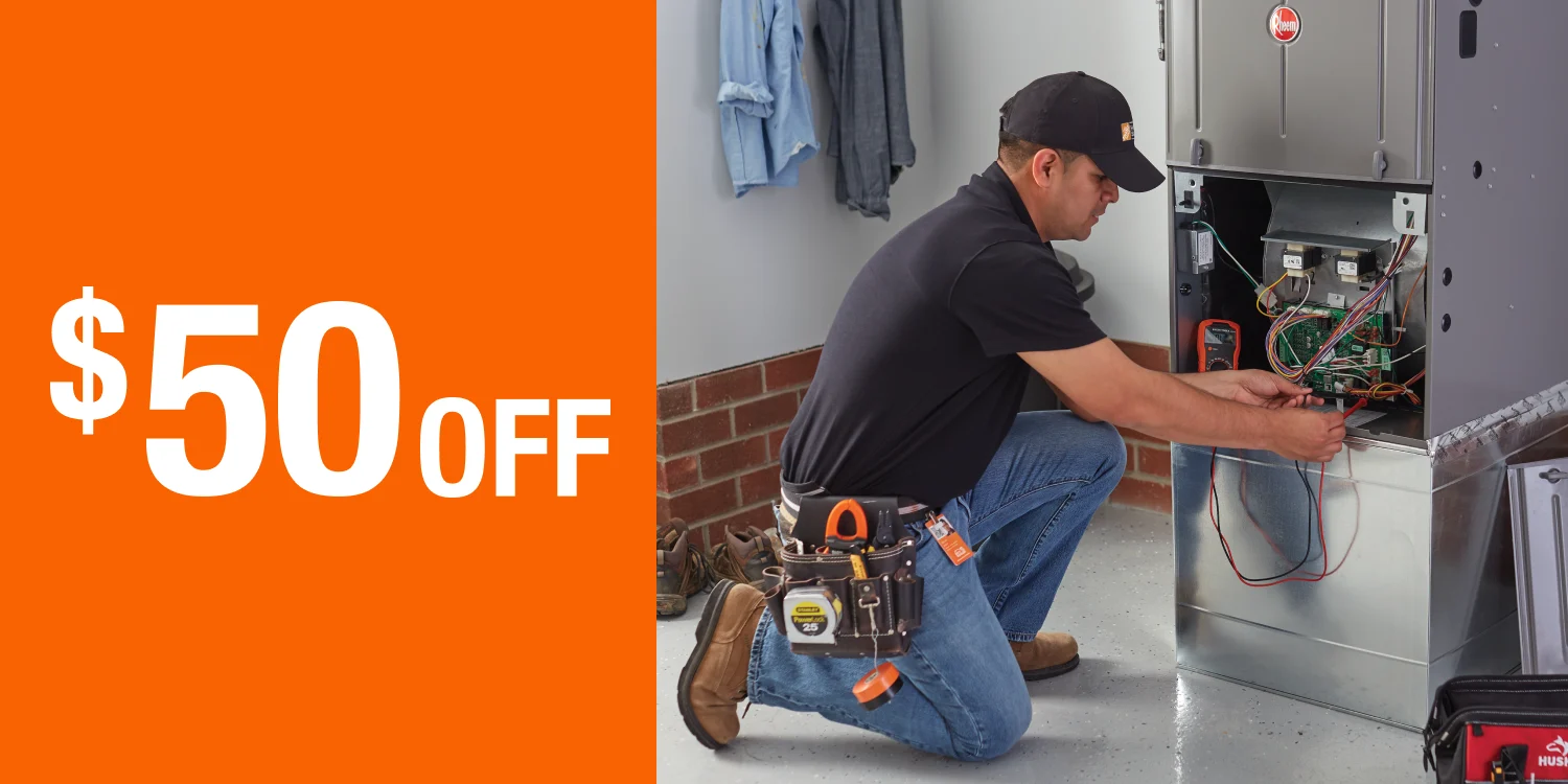 $50 Off article promo; THD service provider repairing an HVAC furnace