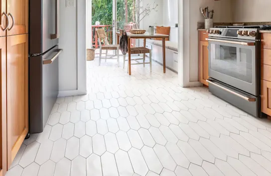 Bright and modern kitchen with tile flooring