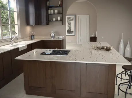 A kitchen with dark wood cabinets and white ultra compact countertops.