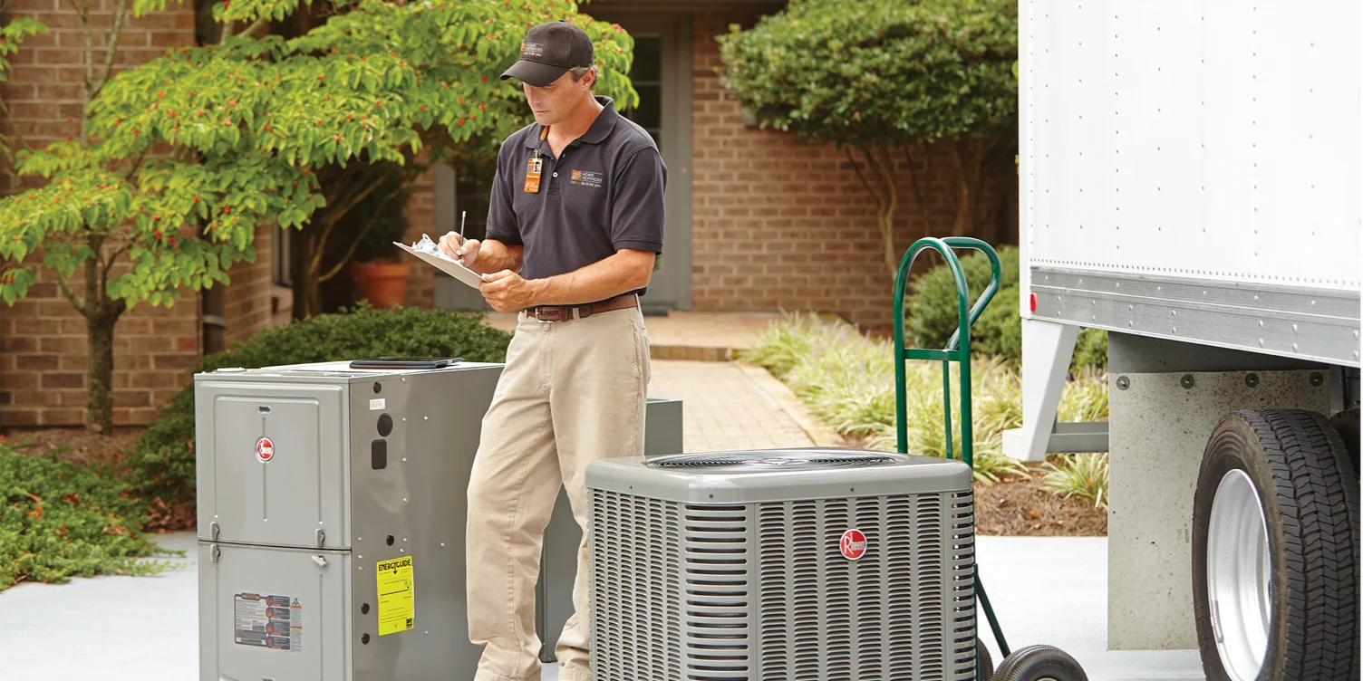 Home Depot pro delivers two HVAC systems on a dolly