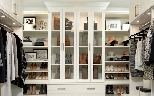 Large luxurious walk-in closet with ample storage