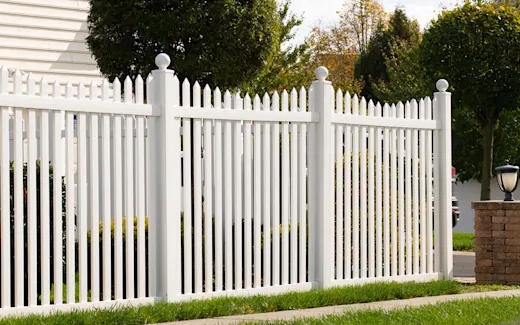 White picket fence in a residential area