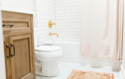 A Guest Bathroom with a color pop blue vanity