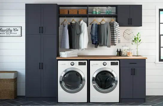 Rustic laundry room with navy cabinets