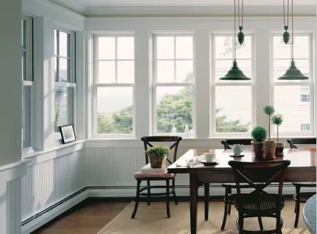 Single hung windows in a white dining room
