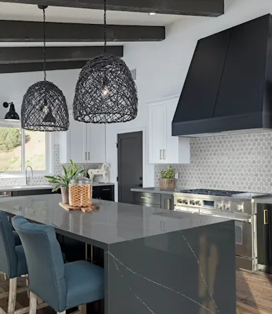 A high end kitchen with quartz soapstone metropolis countertops