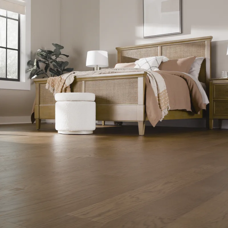 Modern bedroom with dark hardwood flooring