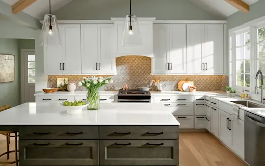 Large, modern, and bright kitchen with refaced KraftMaid cabinets