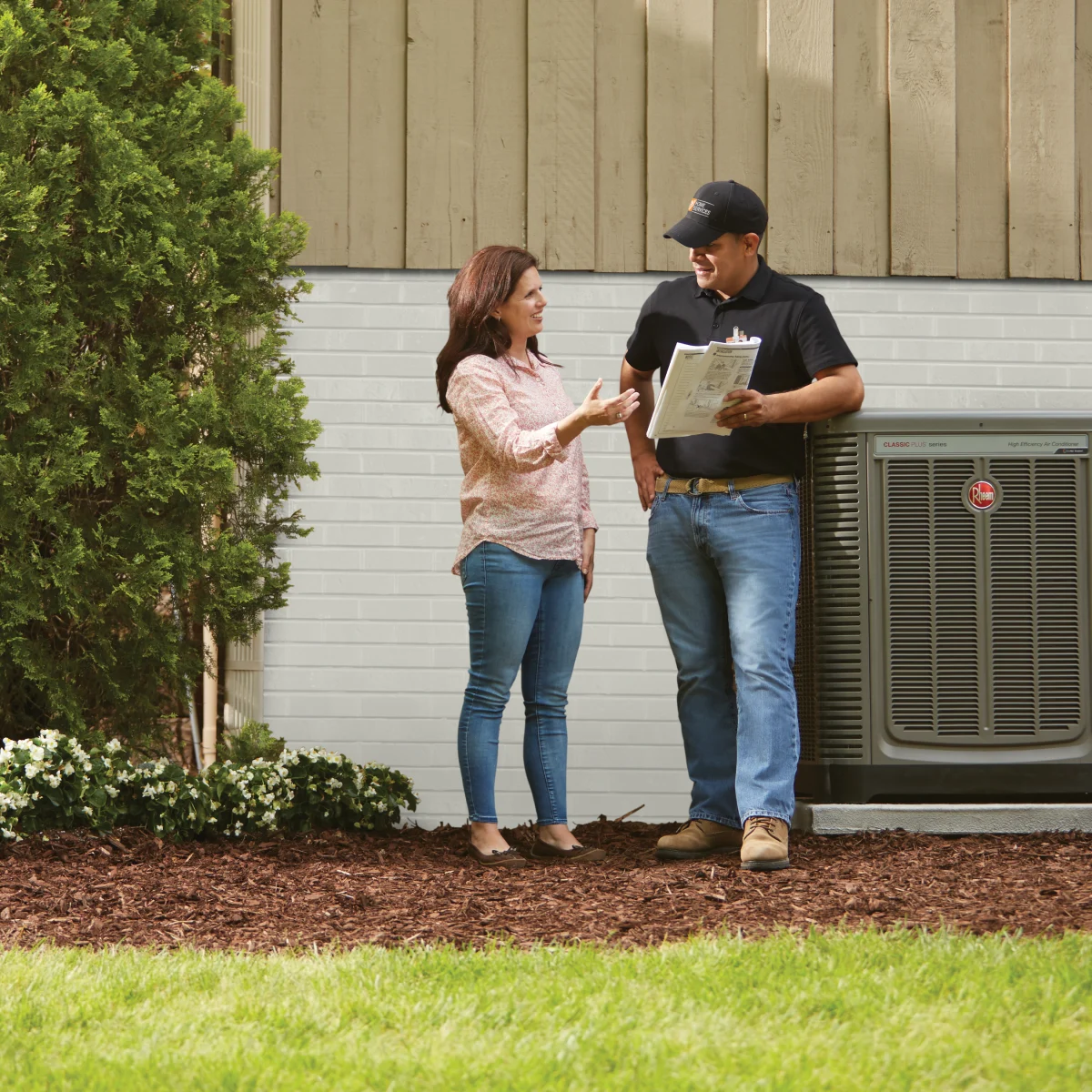 Customer talking to a THD HVAC service pro
