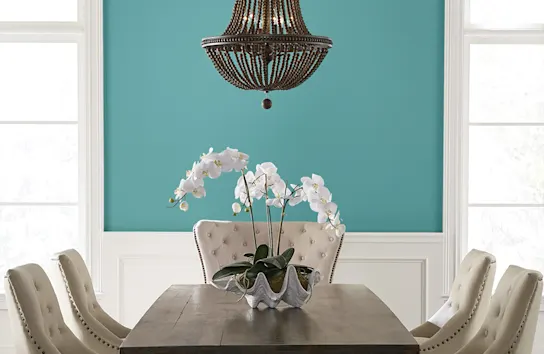 Bright turquoise flat matte painted dining room