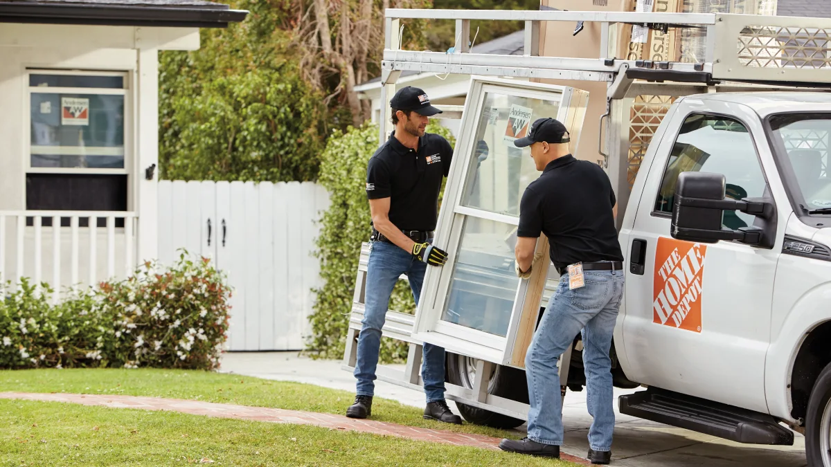 A professional installing a rustic wood look garage