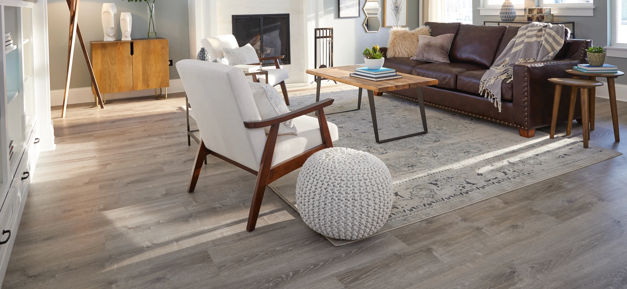 light gray vinyl planks installed in a living room