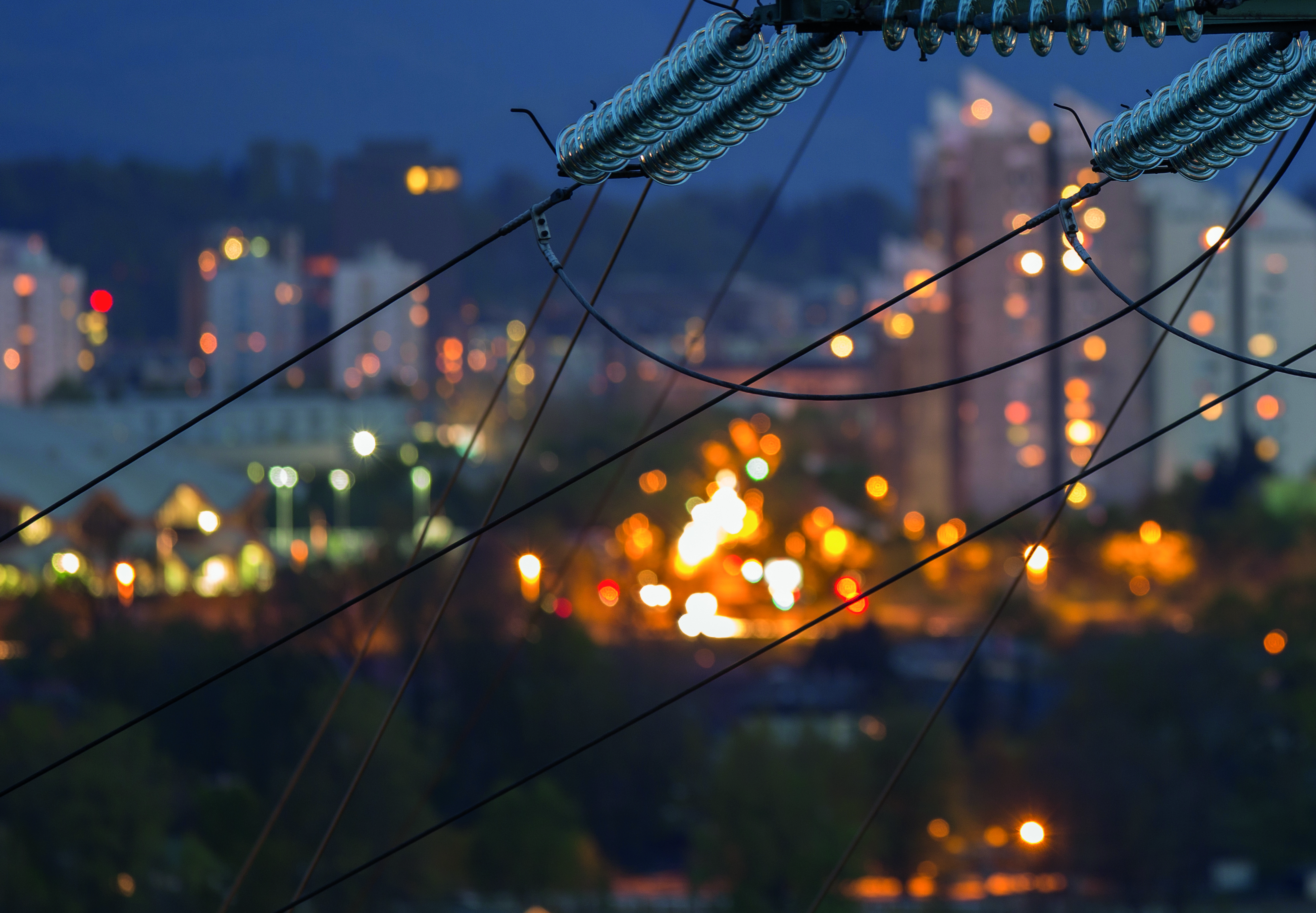 Pylon-and-city-lights.-Electric-infrastructure