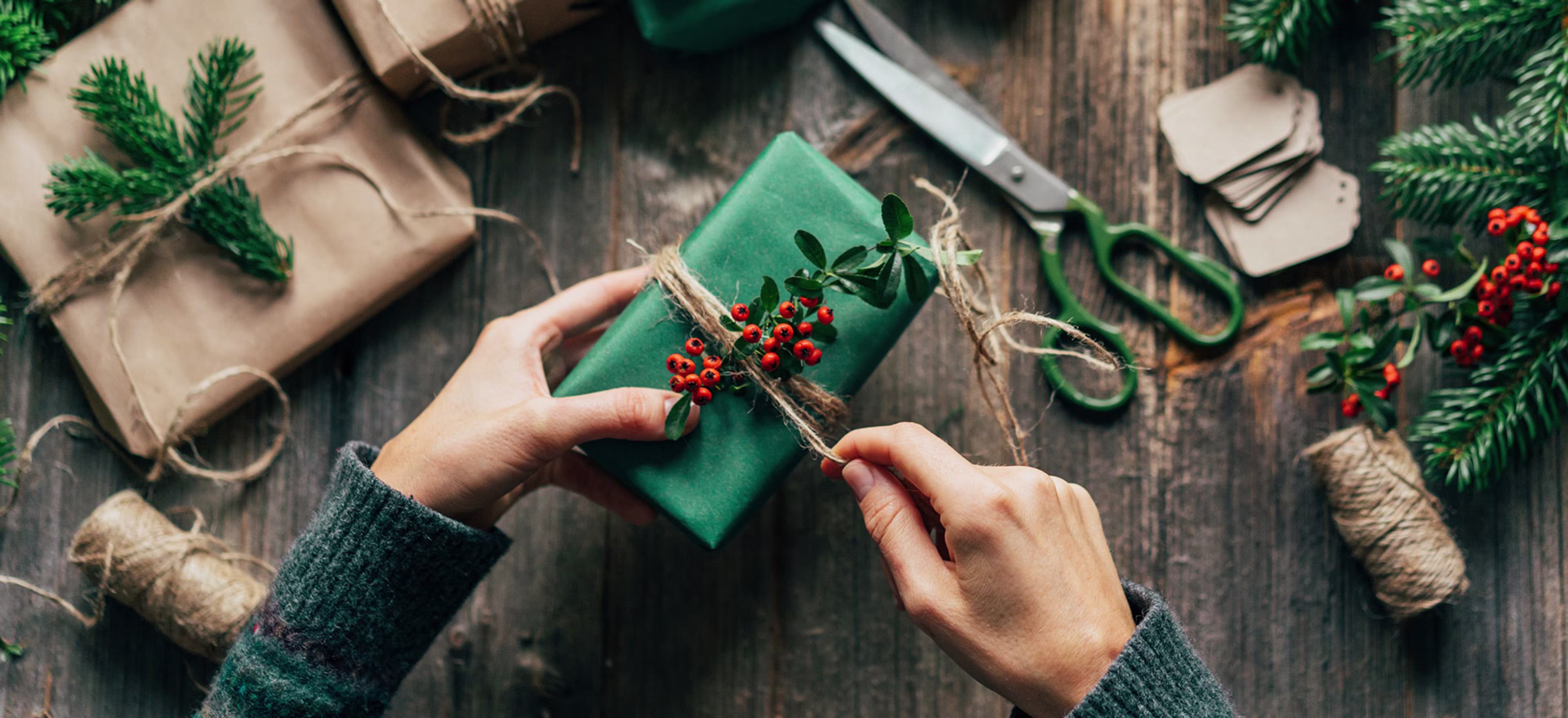 Woman wrapping a Christmas present